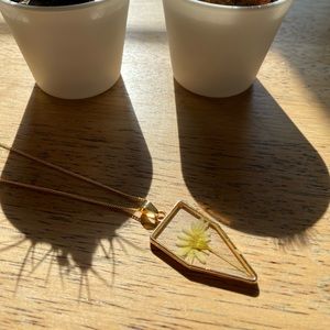 Cute necklace with flowers on it!